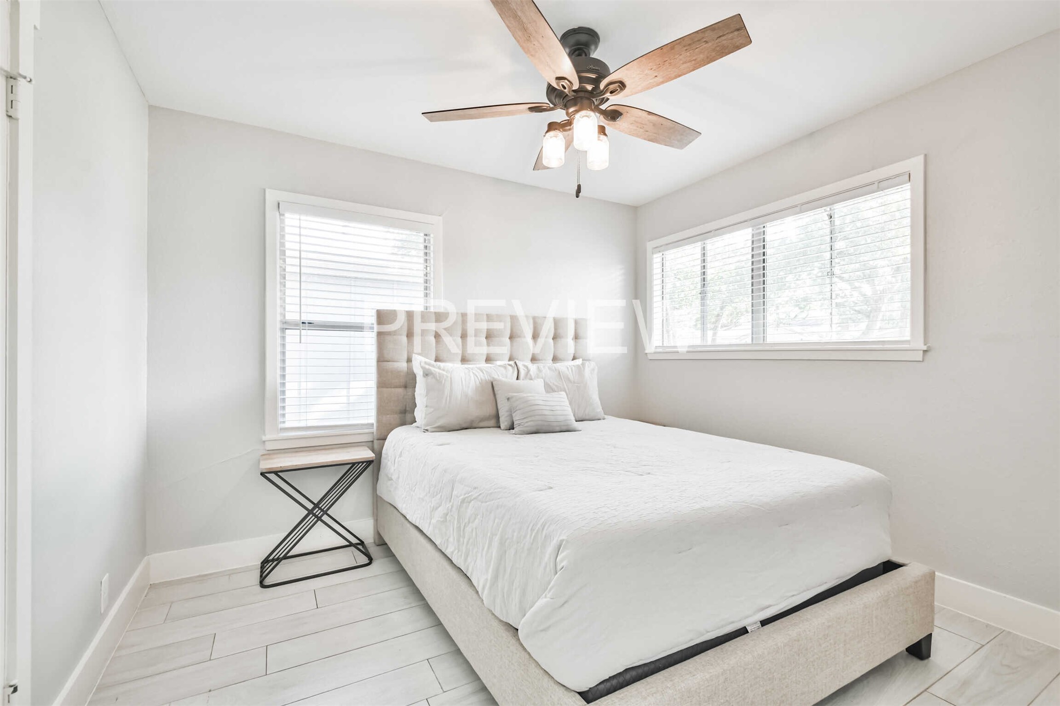 7522 Dearborn Street Houston, TX 77055 - Photo 38 of 39 a bedroom with a bed and a window