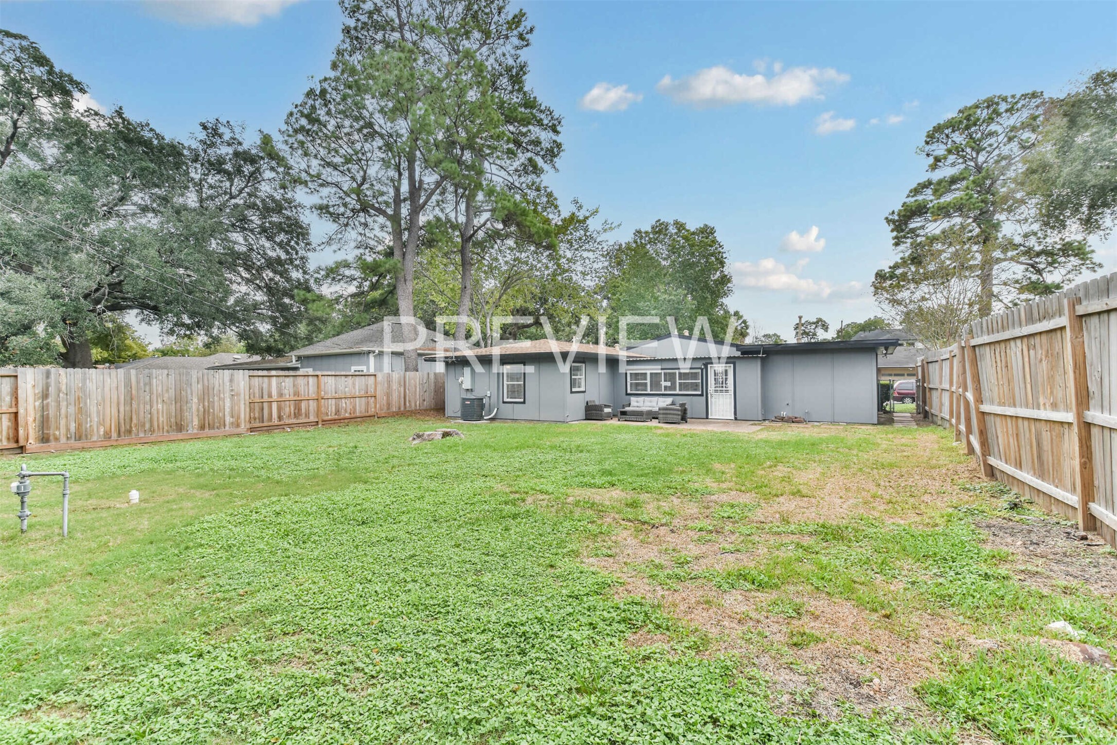 7522 Dearborn Street Houston, TX 77055 - Photo 4 of 39 a view of a backyard with a garden and entertaining space