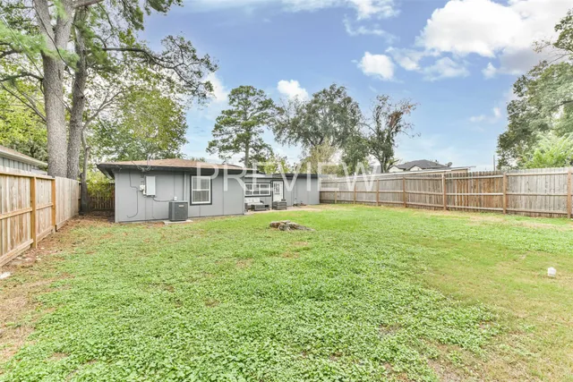 a view of a backyard with a garden