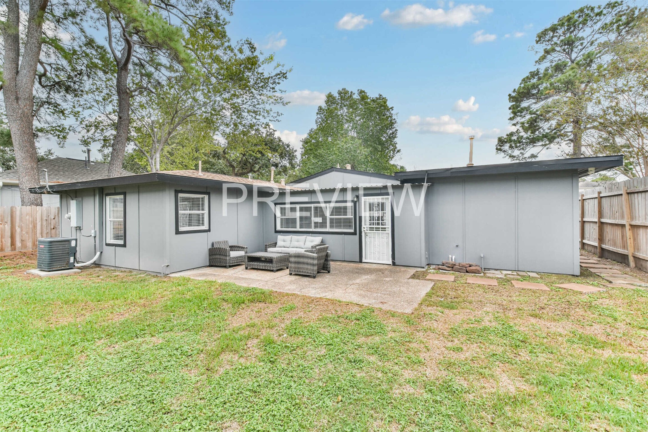 7522 Dearborn Street Houston, TX 77055 - Photo 6 of 39 a view of a house with backyard and sitting area