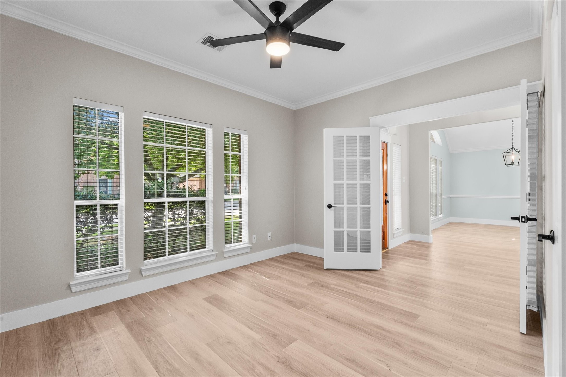 30111 Granum Drive Spring, TX 77386 - Photo 15 of 45 a view of an empty room with wooden floor and a window