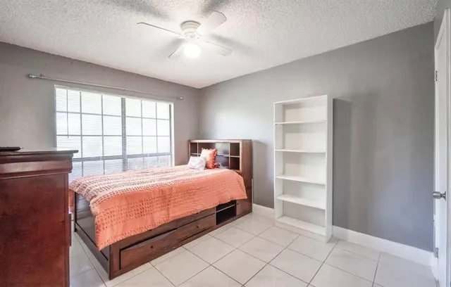 a outdoor living space with furniture and a rug