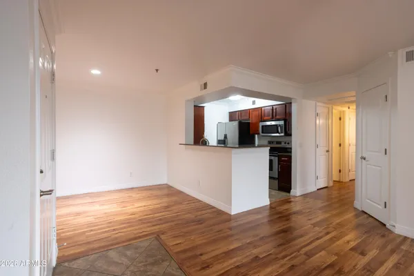 a view of a kitchen from the hallway