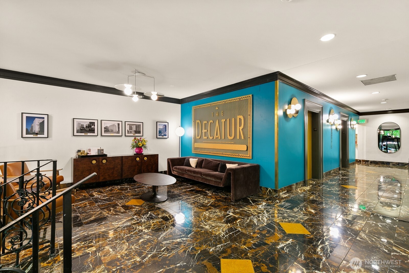 1105 Spring Street, Unit 1106 Seattle, WA 98104 - Photo 2 of 11 a living room with furniture