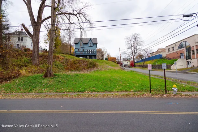 a view of a street with houses