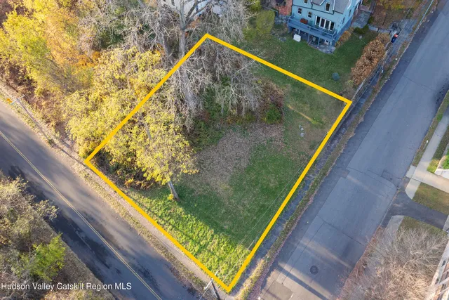 a view of swimming pool from a balcony
