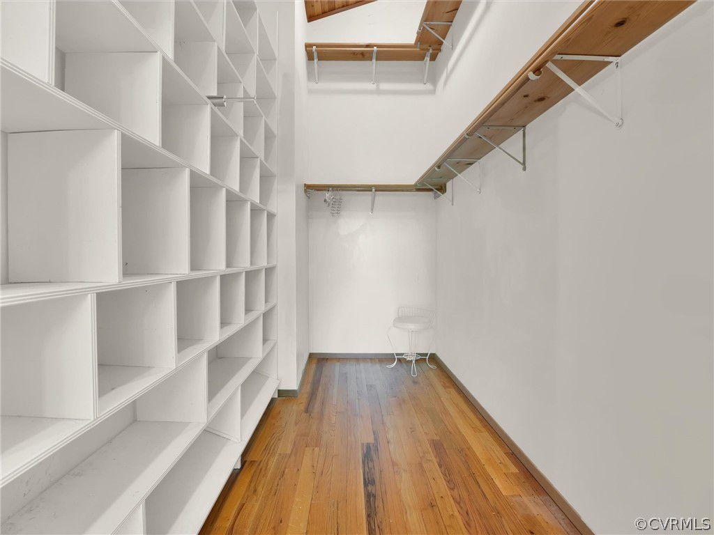 649 Kennsbury Road Hardyville, VA 23070 - Photo 24 of 50 a view of walk in closet with wooden floor