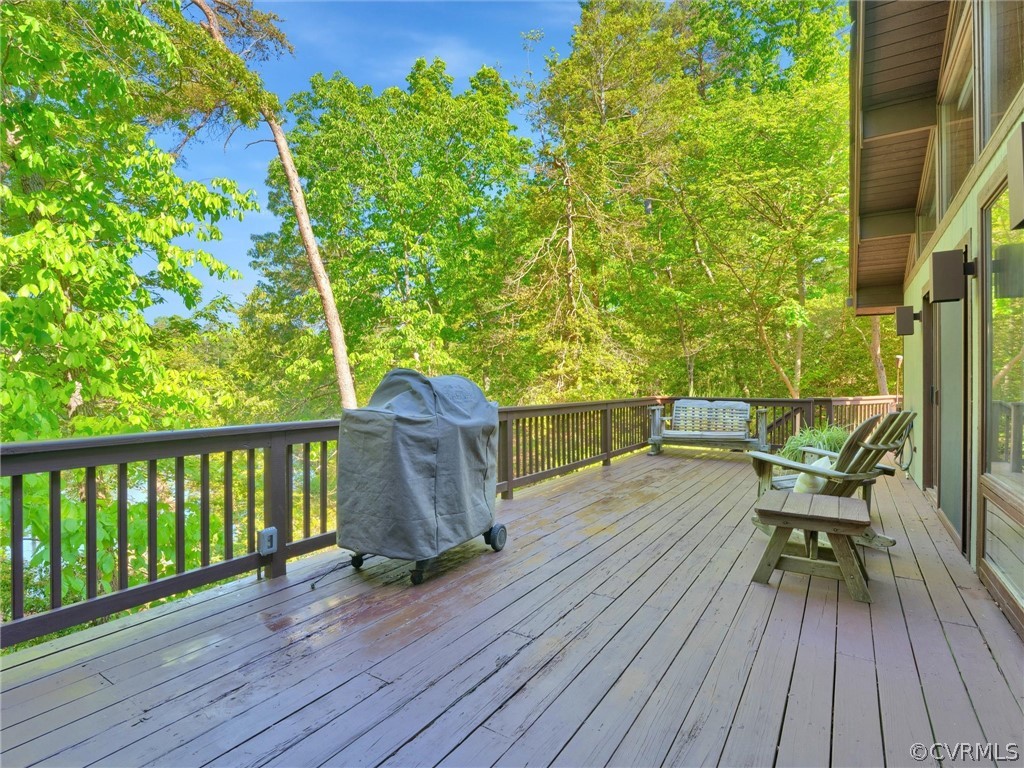649 Kennsbury Road Hardyville, VA 23070 - Photo 30 of 50 a view of balcony with furniture and wooden floor