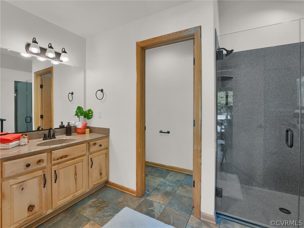 649 Kennsbury Road Hardyville, VA 23070 - Photo 41 of 50 a spacious bathroom with a double vanity sink mirror and shower