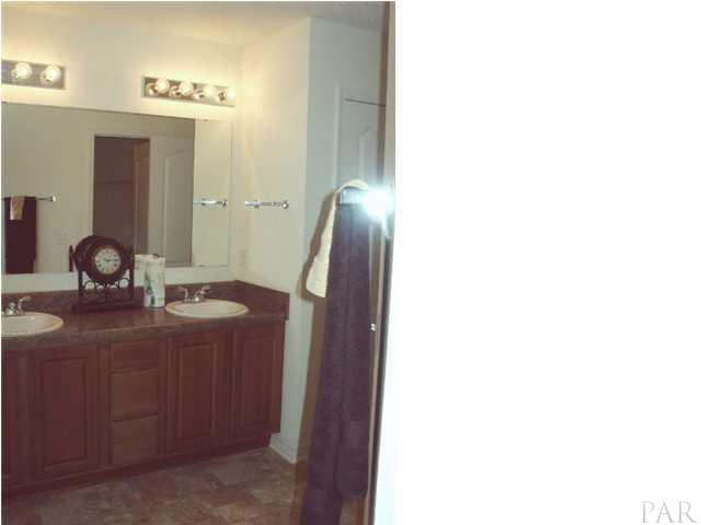 2260 Liberty Loop Road, Unit 21D Cantonment, FL 32533 - Photo 17 of 19 master bath shower and soaking tub