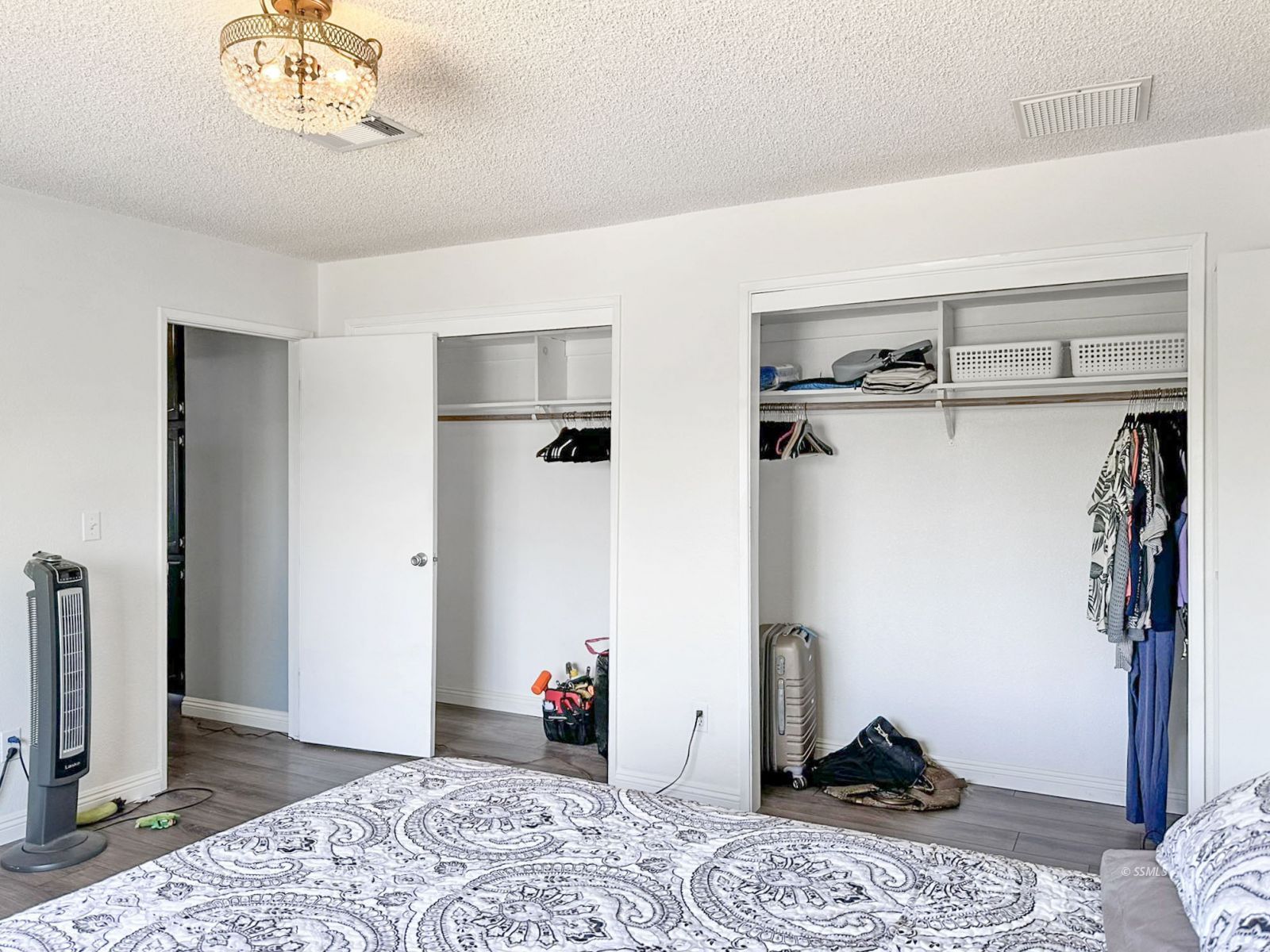 724 West Dolphin Avenue Ridgecrest, CA 93555 - Photo 38 of 50 a view of a room with wooden floor and closet