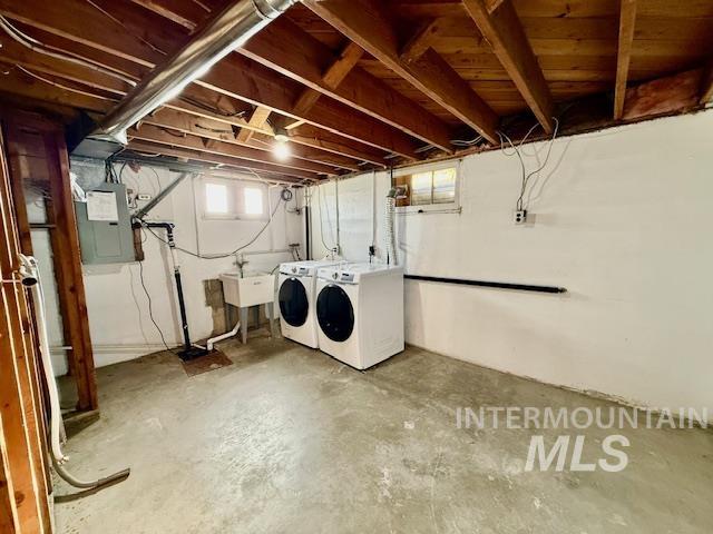 1139 Webster Street Clarkston, WA 99403 - Photo 31 of 34 Below grade area featuring separate washer and dryer and electric panel