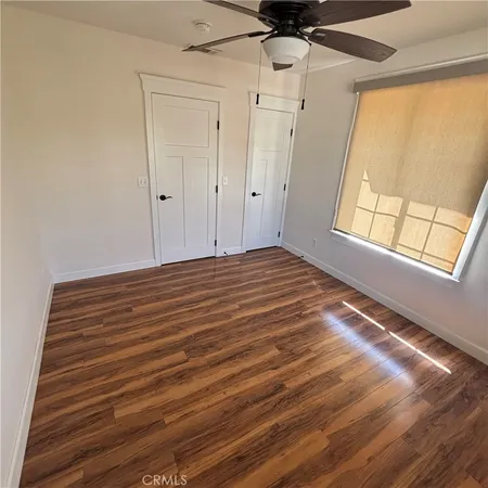 a kitchen with stainless steel appliances granite countertop a refrigerator stove and sink