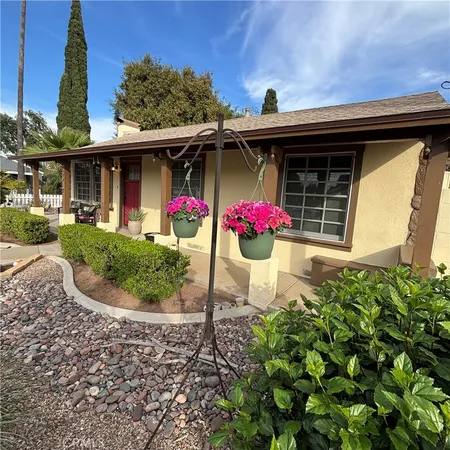 front view of a house with a small yard