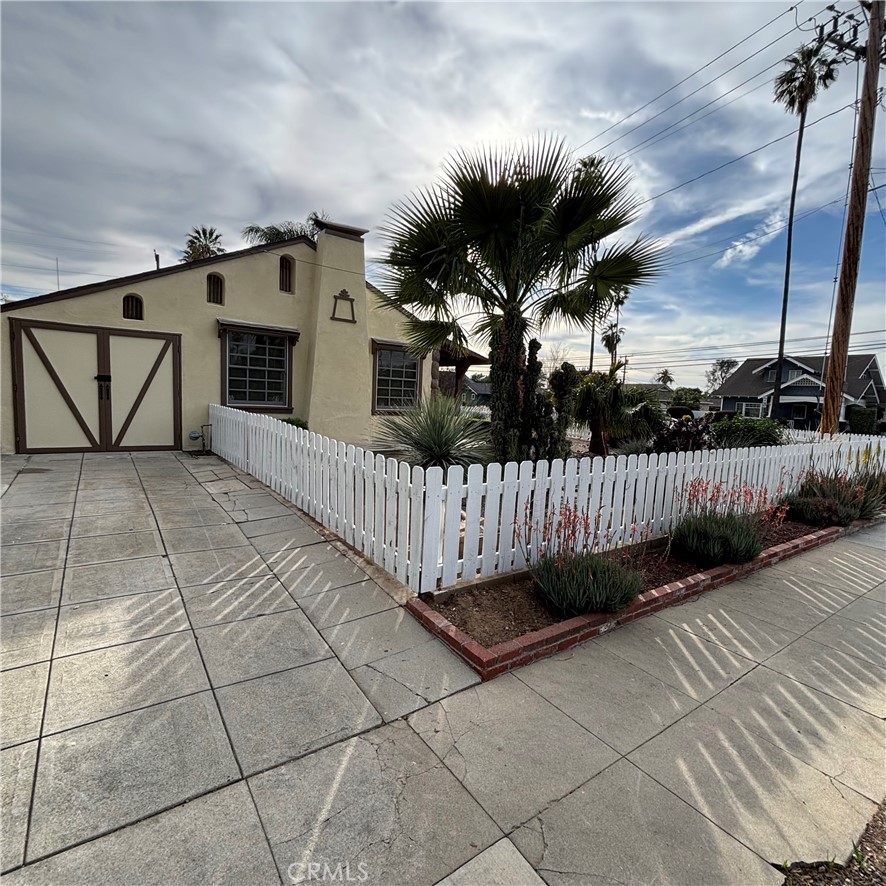 5012 Brockton Avenue Riverside, CA 92506 - Photo 6 of 28 a view of a wrought iron fences in front of house