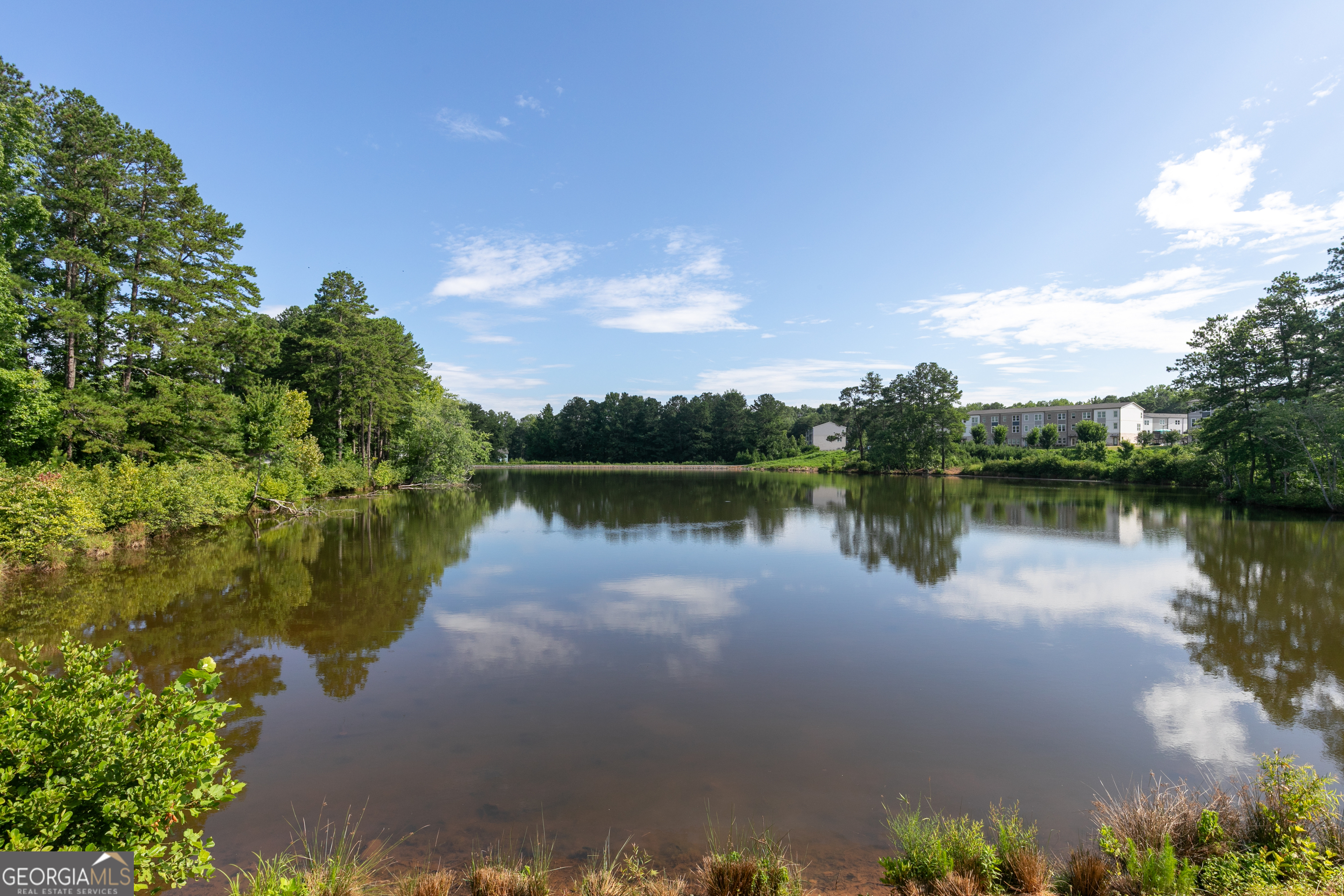732 Coventry Cv Way Acworth, GA 30102 - Photo 21 of 41 a view of a lake with a city