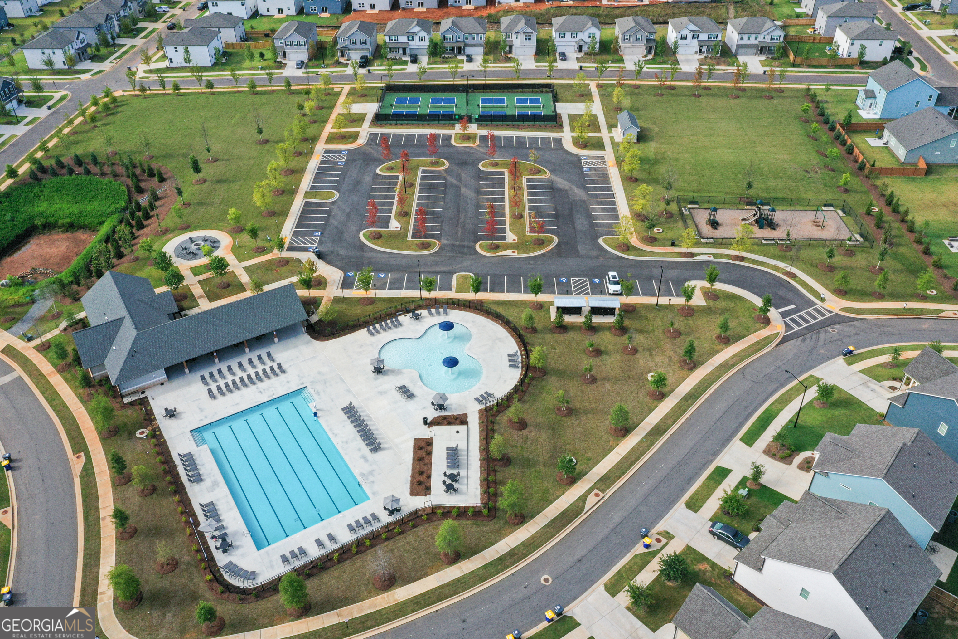 732 Coventry Cv Way Acworth, GA 30102 - Photo 27 of 41 an aerial view of a swimming pool with outdoor seating lake view and mountain view