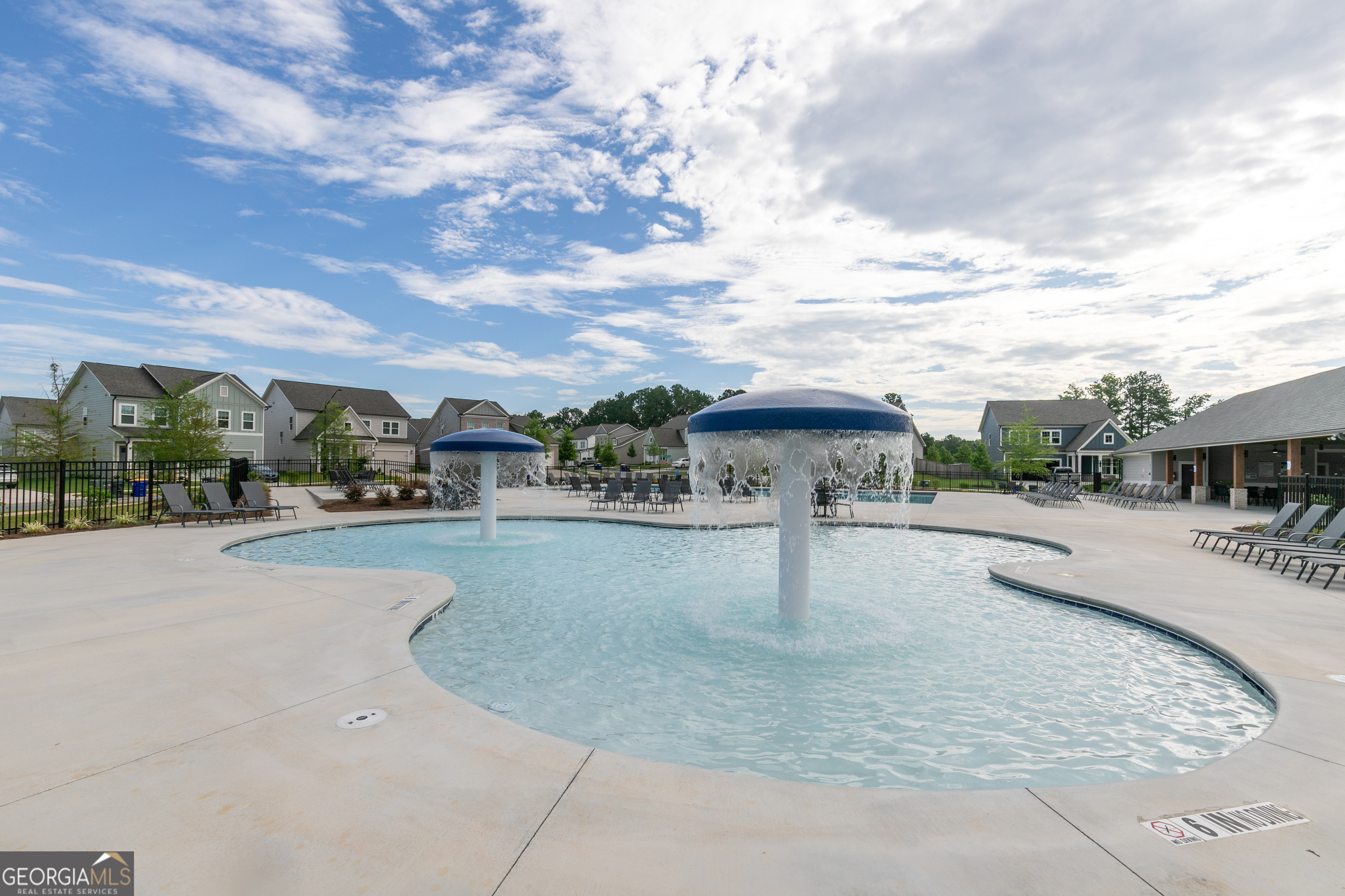 732 Coventry Cv Way Acworth, GA 30102 - Photo 35 of 41 a view of a swimming pool and trees in the background