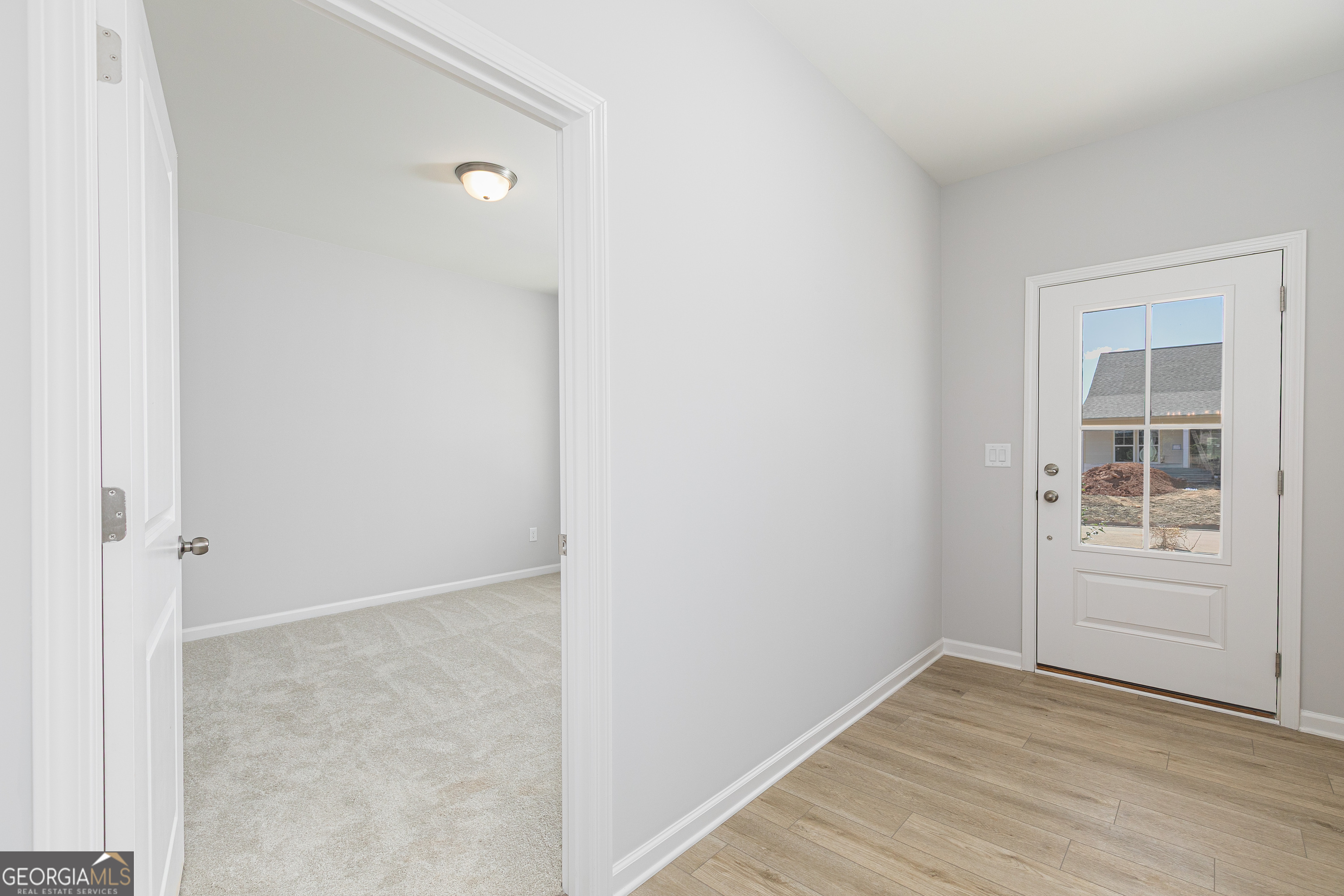 732 Coventry Cv Way Acworth, GA 30102 - Photo 4 of 41 an empty room with windows