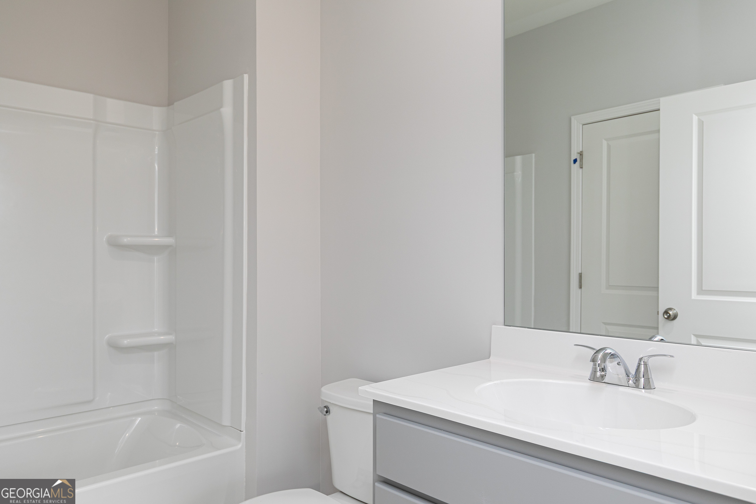 732 Coventry Cv Way Acworth, GA 30102 - Photo 7 of 41 a bathroom with a sink toilet and vanity
