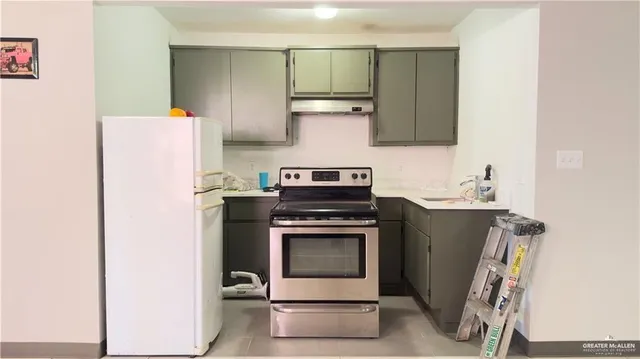 a bathroom with a toilet a sink and shower