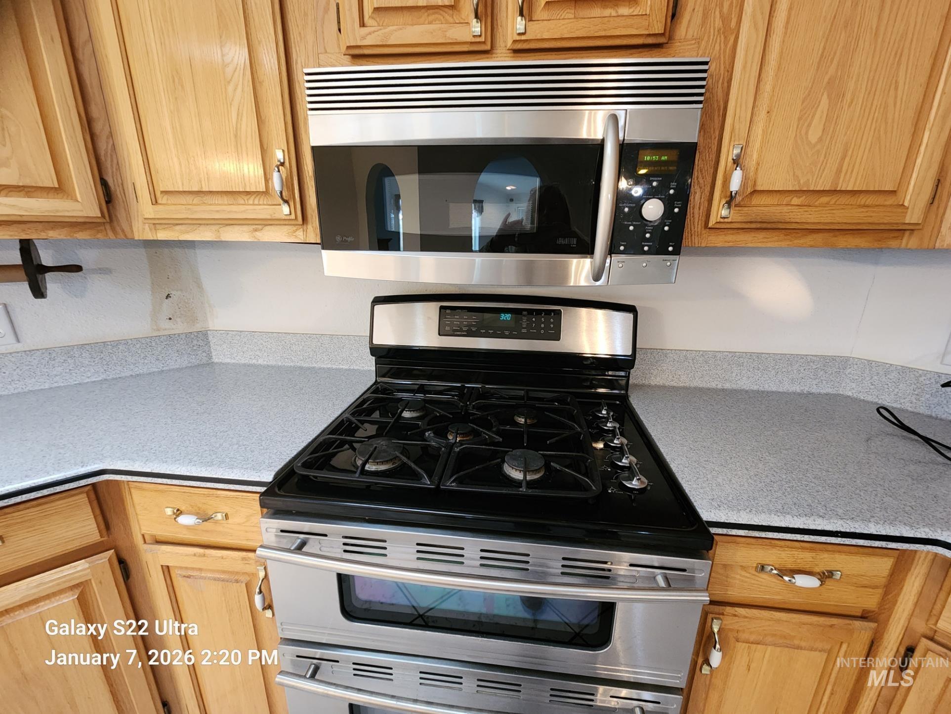 650 Ash Street Vale, OR 97918 - Photo 15 of 23 Kitchen featuring appliances with stainless steel finishes and light stone counters