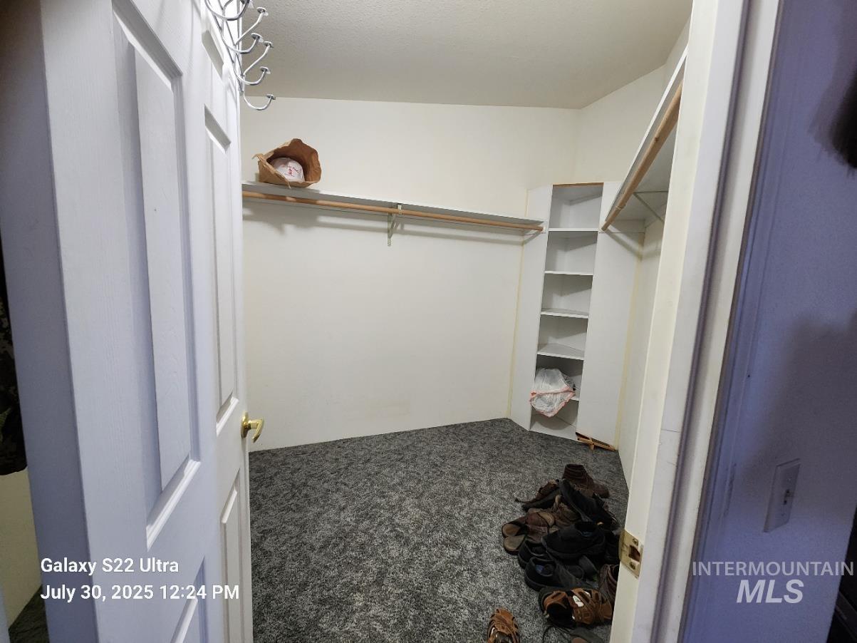 650 Ash Street Vale, OR 97918 - Photo 18 of 24 Spacious closet with carpet floors