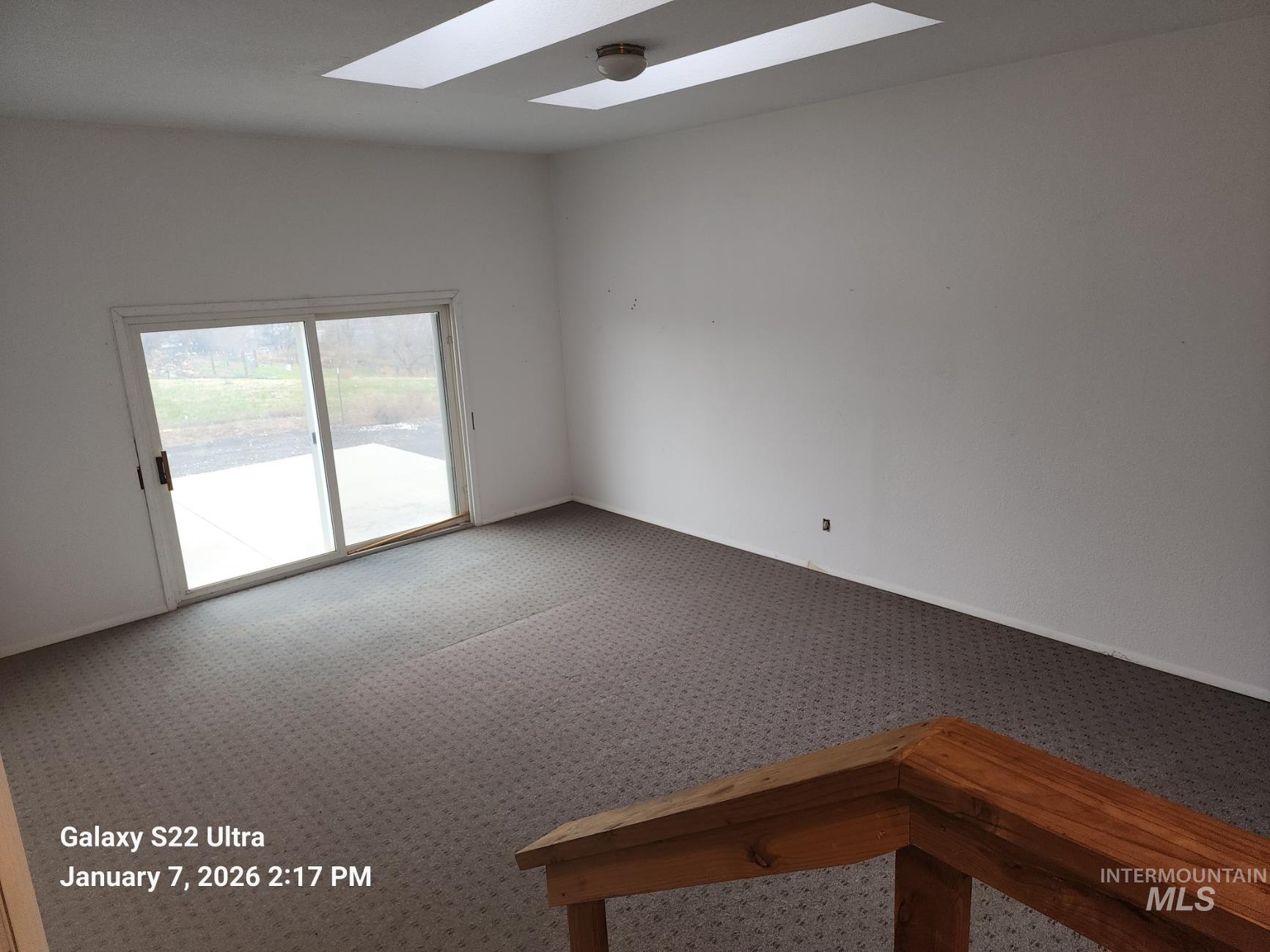 650 Ash Street Vale, OR 97918 - Photo 20 of 23 Unfurnished room with carpet and a skylight