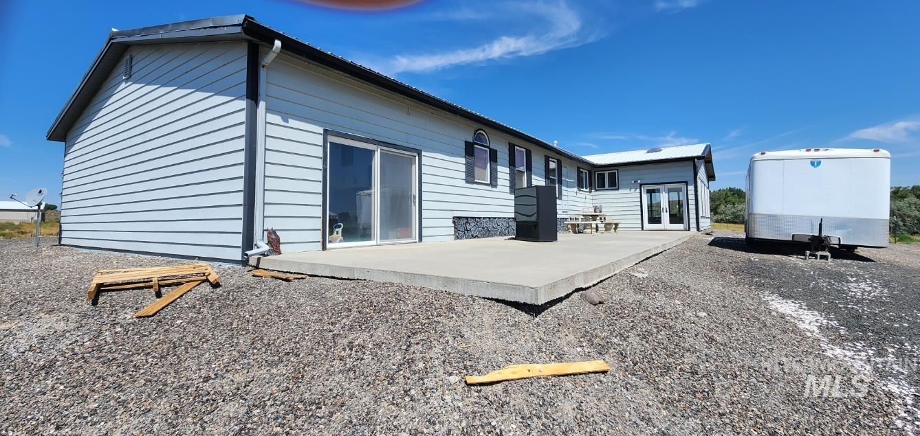 650 Ash Street Vale, OR 97918 - Photo 2 of 24 Rear view of house featuring french doors and a patio