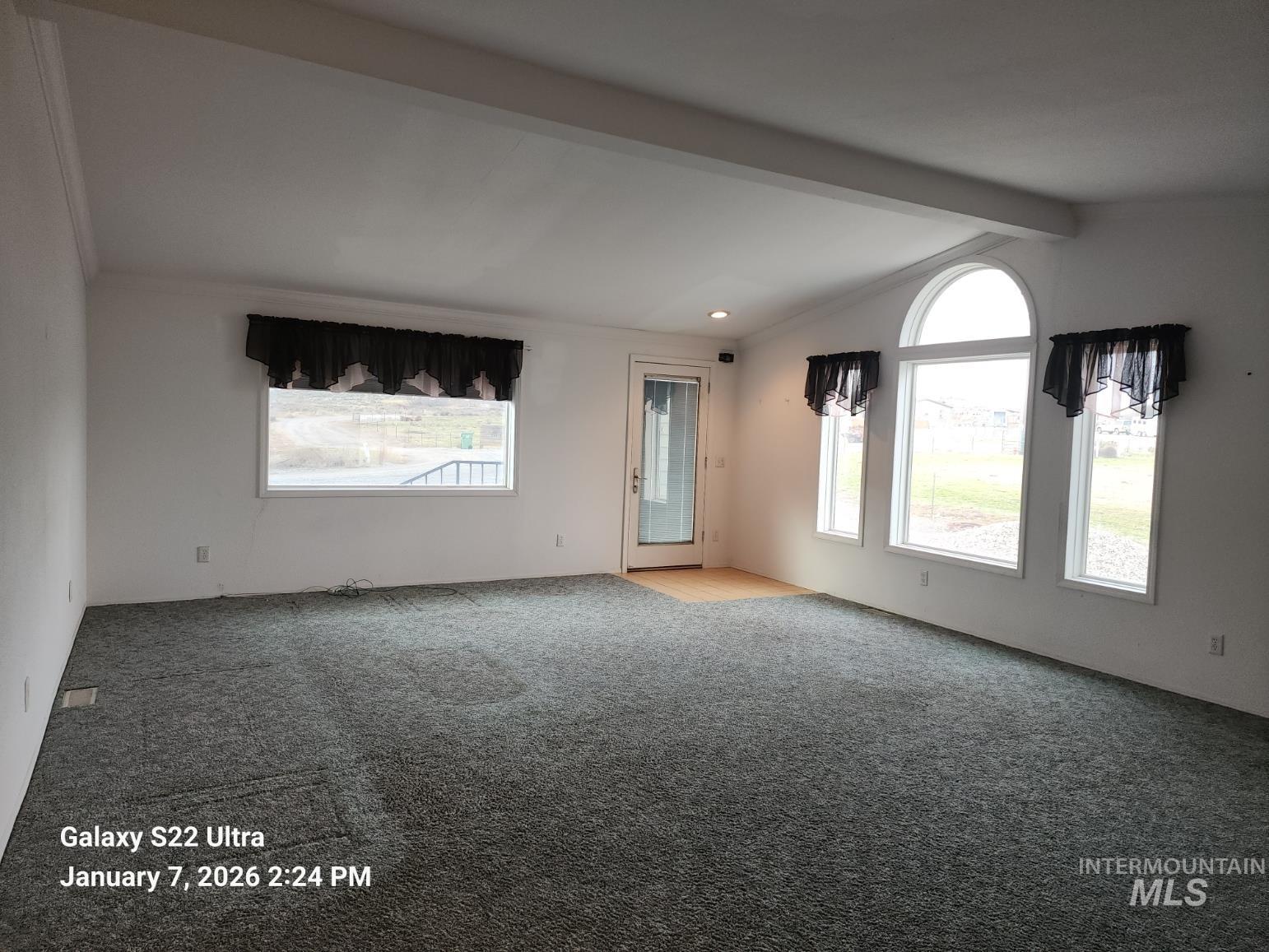650 Ash Street Vale, OR 97918 - Photo 10 of 23 View of carpeted empty room