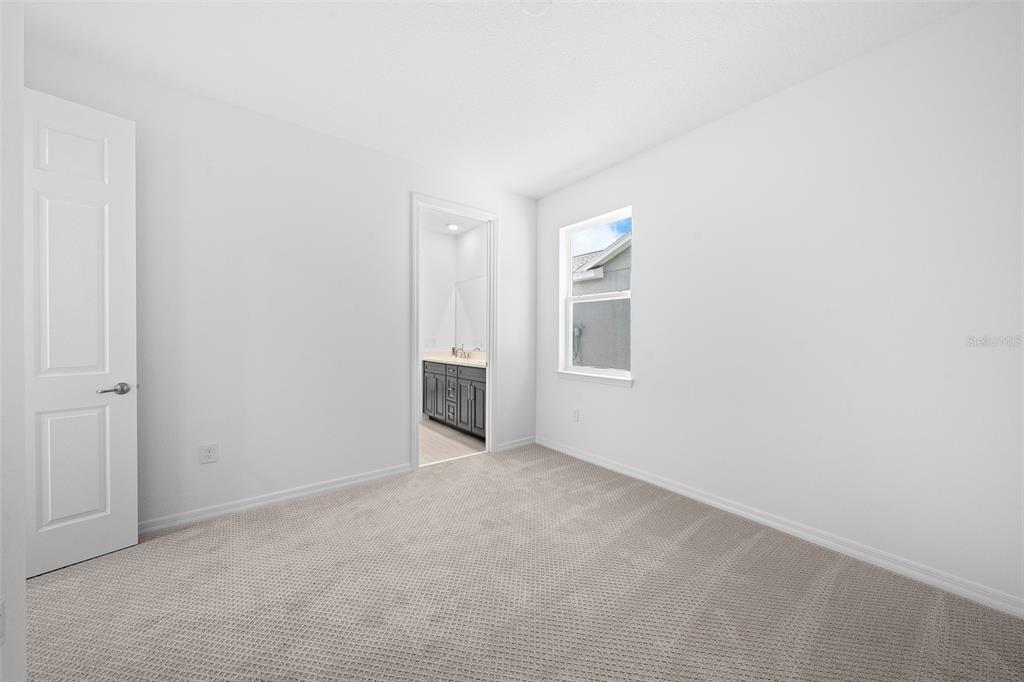 6303 Southwest 75th Ct Road Ocala, FL 34474 - Photo 34 of 50 a view of an empty room with a window