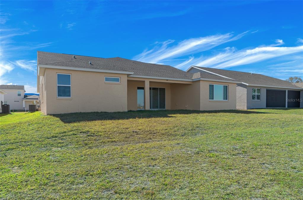 6303 Southwest 75th Ct Road Ocala, FL 34474 - Photo 48 of 50 a house with a outdoor space