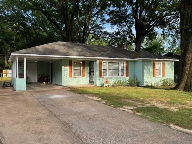 1244 Dearing Road Memphis, TN 38117 - Photo 1 of 23 front view of a house with a yard