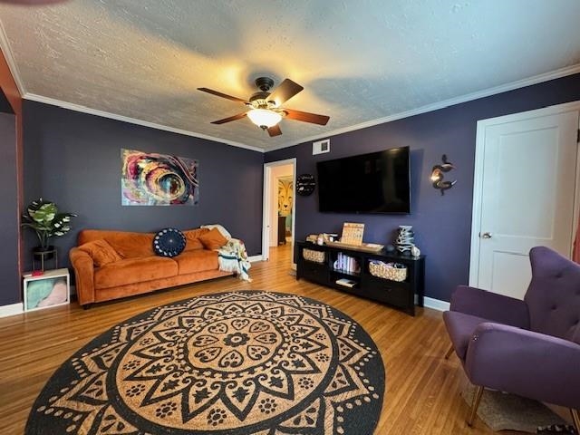 1244 Dearing Road Memphis, TN 38117 - Photo 3 of 23 a bedroom with furniture and a flat screen tv