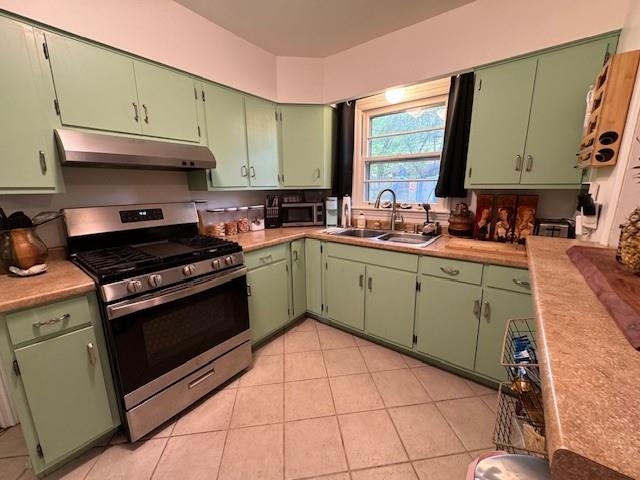 1244 Dearing Road Memphis, TN 38117 - Photo 8 of 23 a kitchen with a sink a stove and cabinets