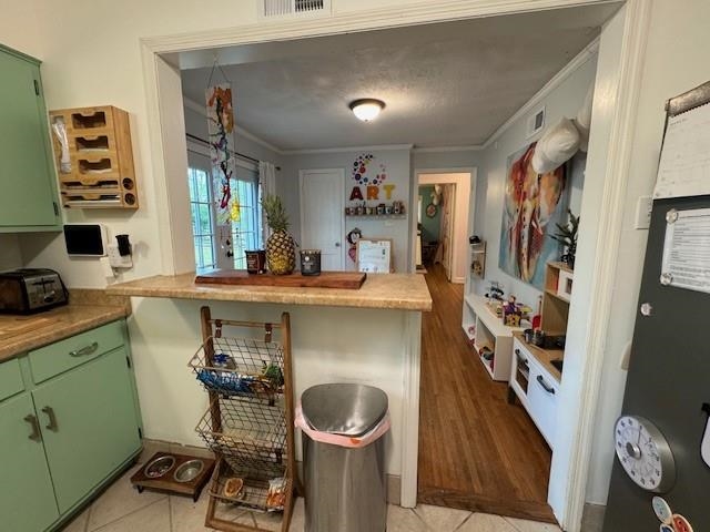 1244 Dearing Road Memphis, TN 38117 - Photo 10 of 23 a room with cabinets and a wooden floor