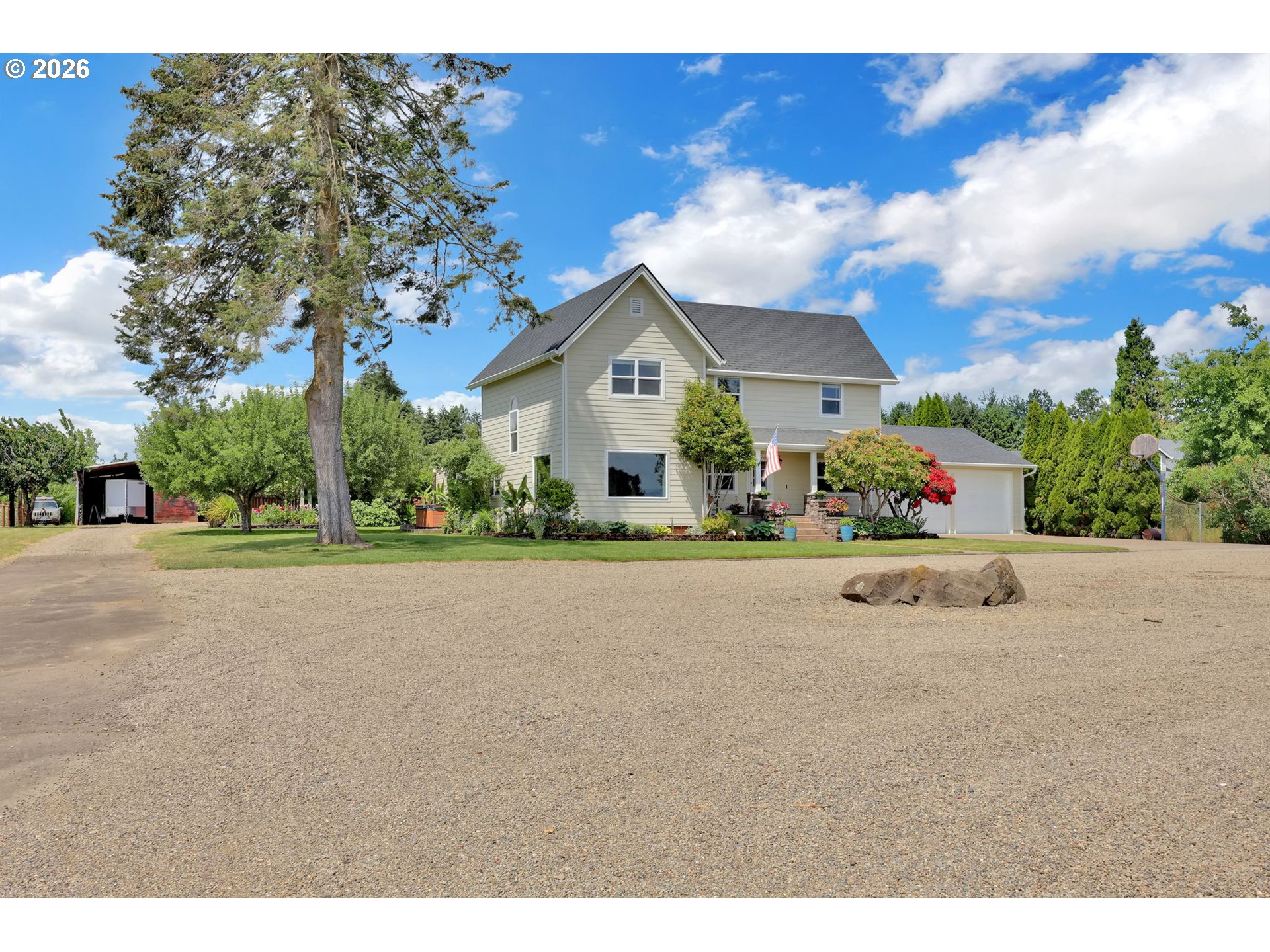 90440 Goodman Road Junction City, OR 97448 - Photo 29 of 48 a front view of house with yard and trees around