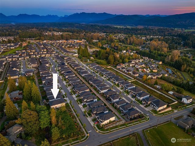 a view of a city with a lake