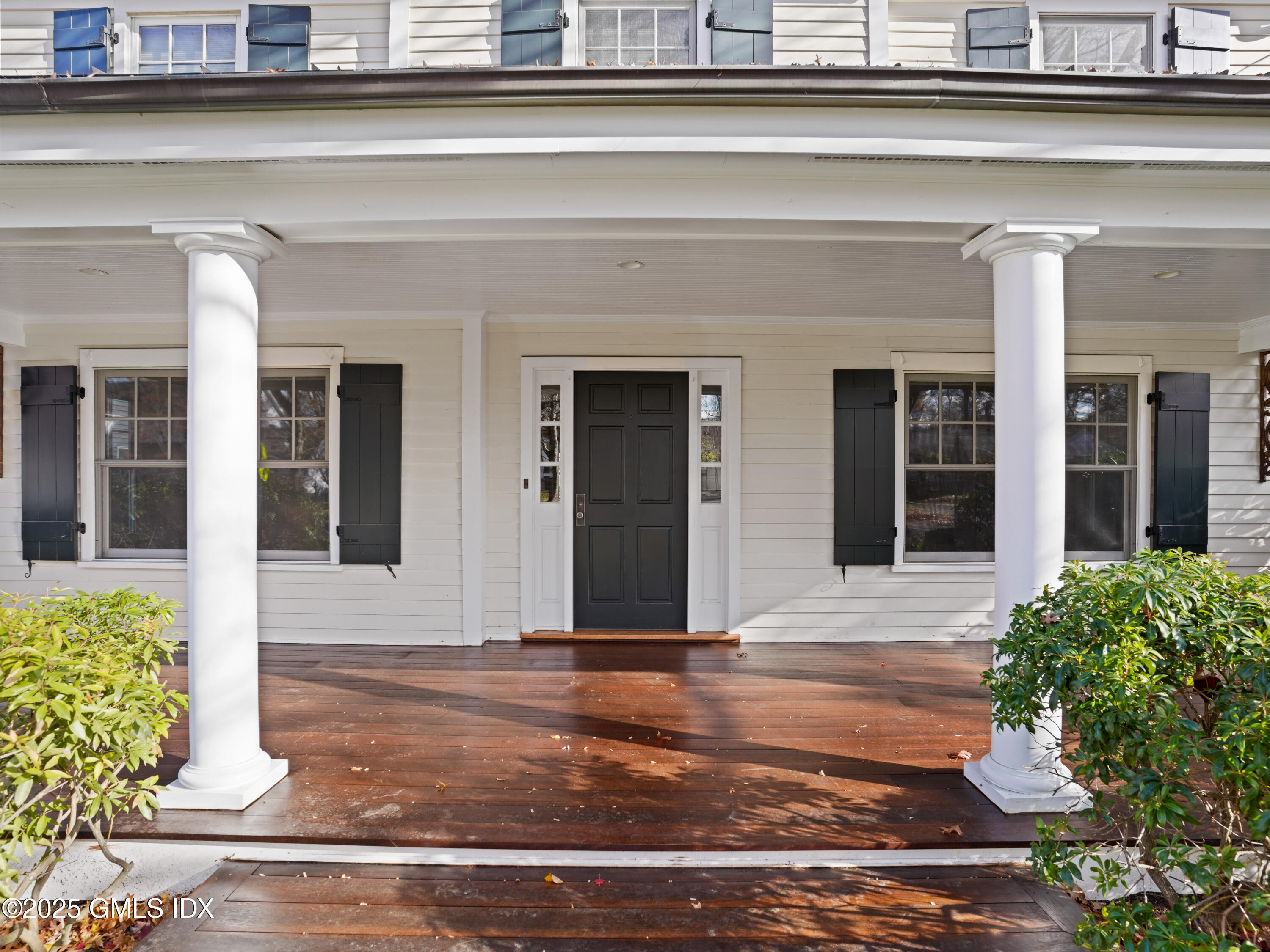 77 Sheep Hill Road Riverside, CT 06878 - Photo 2 of 34 a front view of a house with garden