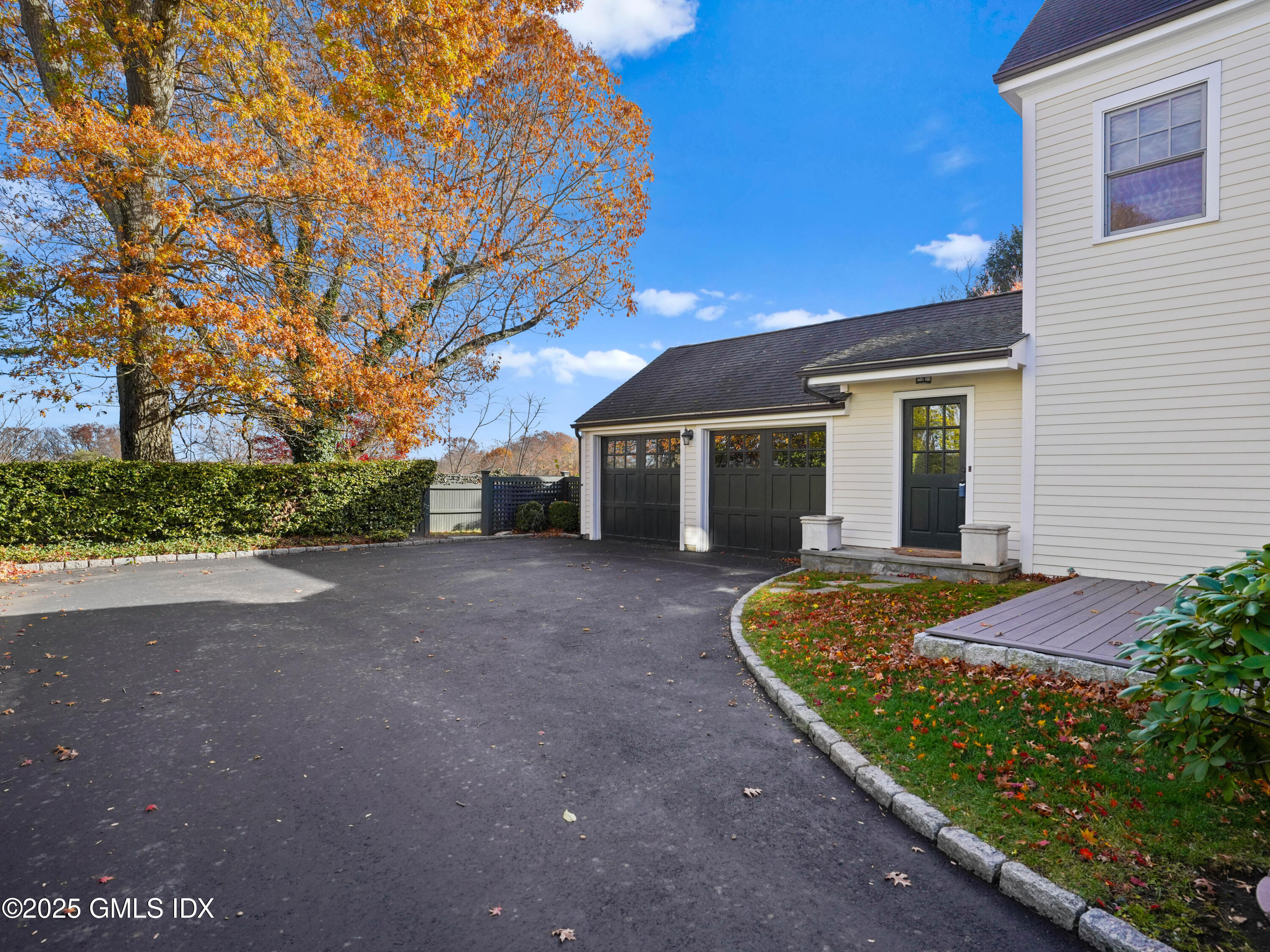 77 Sheep Hill Road Riverside, CT 06878 - Photo 22 of 34 a view of a house with backyard and tree