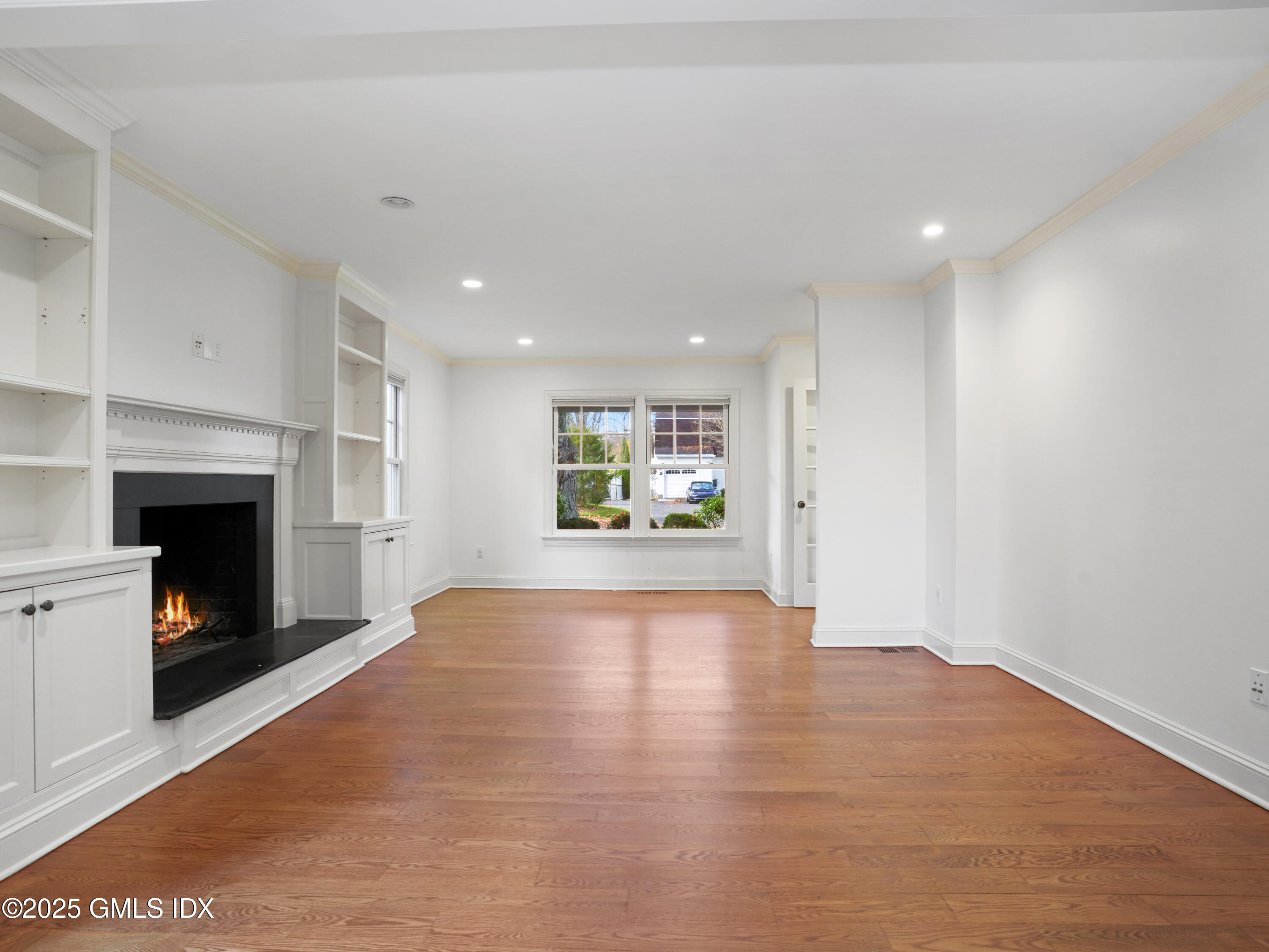 77 Sheep Hill Road Riverside, CT 06878 - Photo 23 of 34 a view of an empty room with a fireplace