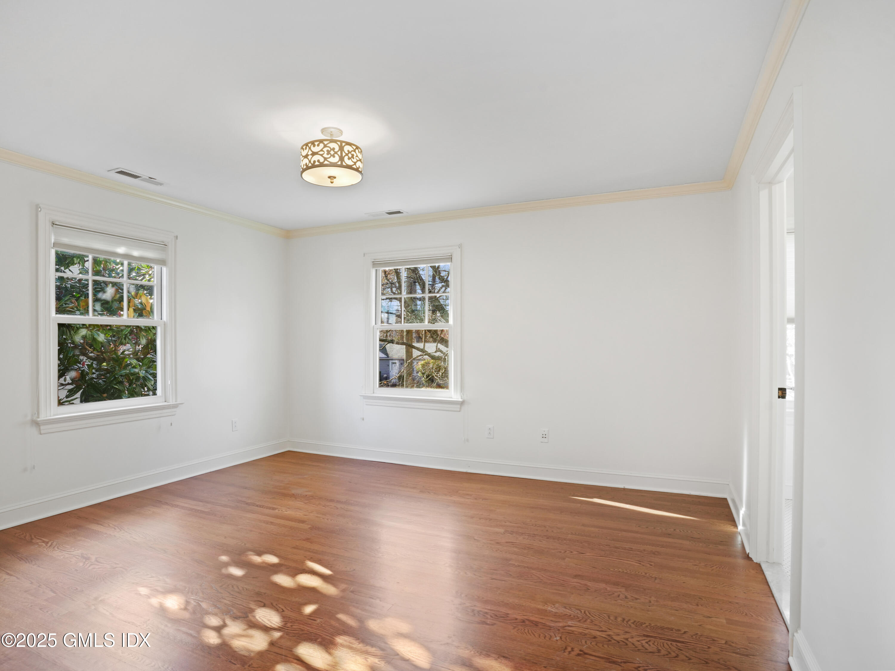 77 Sheep Hill Road Riverside, CT 06878 - Photo 27 of 34 an empty room with a window
