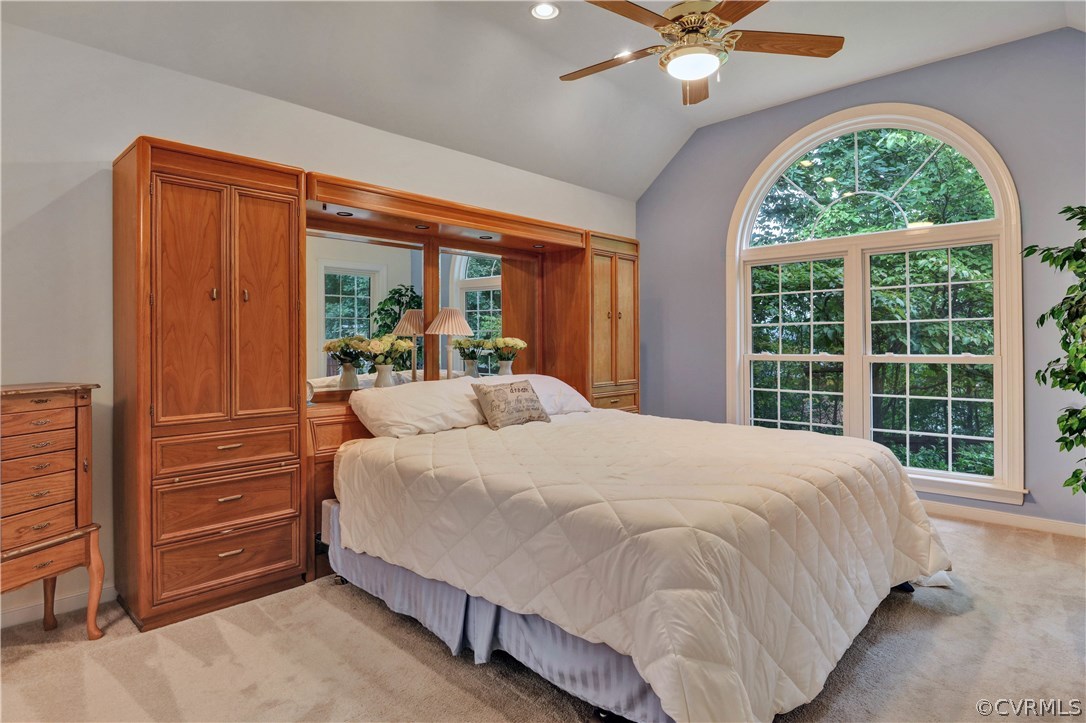 12907 Rockridge Road Chester, VA 23831 - Photo 10 of 20 a bed sitting in a spacious bedroom next to a window