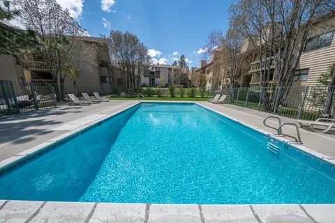 a view of a house with swimming pool