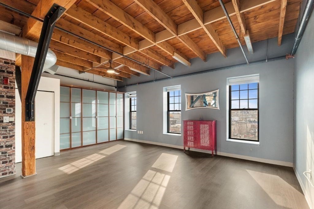 60 Dudley Street, Unit 32 Chelsea, MA 02150 - Photo 14 of 38 a view of an empty room with windows