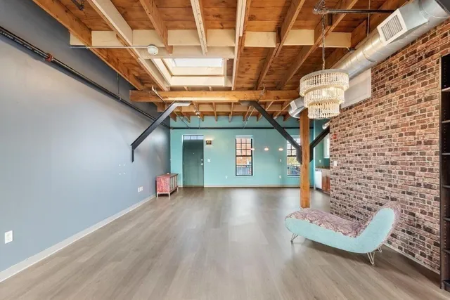 a view of wooden floor in an empty room