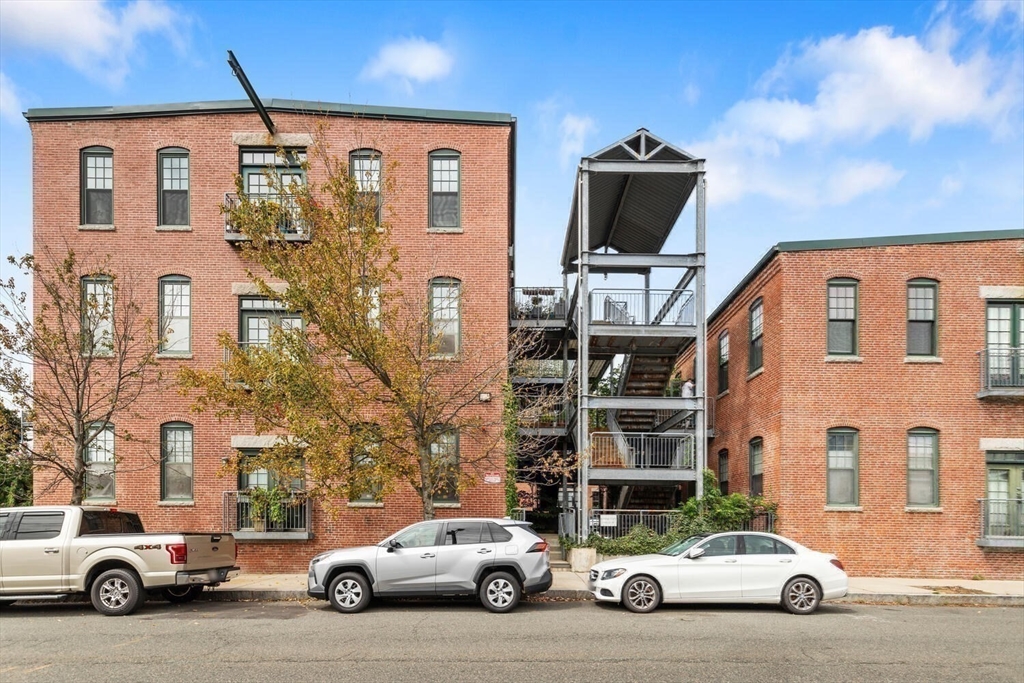 60 Dudley Street, Unit 32 Chelsea, MA 02150 - Photo 25 of 38 a car parked in front of a building