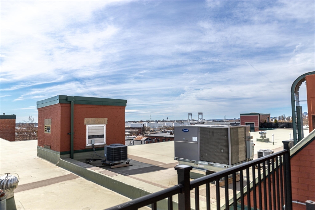 60 Dudley Street, Unit 32 Chelsea, MA 02150 - Photo 35 of 38 a view of a balcony with city view