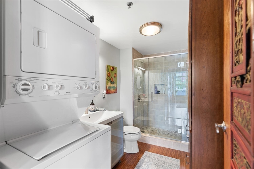 60 Dudley Street, Unit 32 Chelsea, MA 02150 - Photo 6 of 38 a bathroom with a sink a toilet and shower