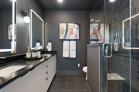 a bedroom with bed and a window